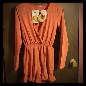 Coco love small burnt orange romper with ruffles